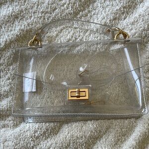 Transparent Handbag with Gold Accents